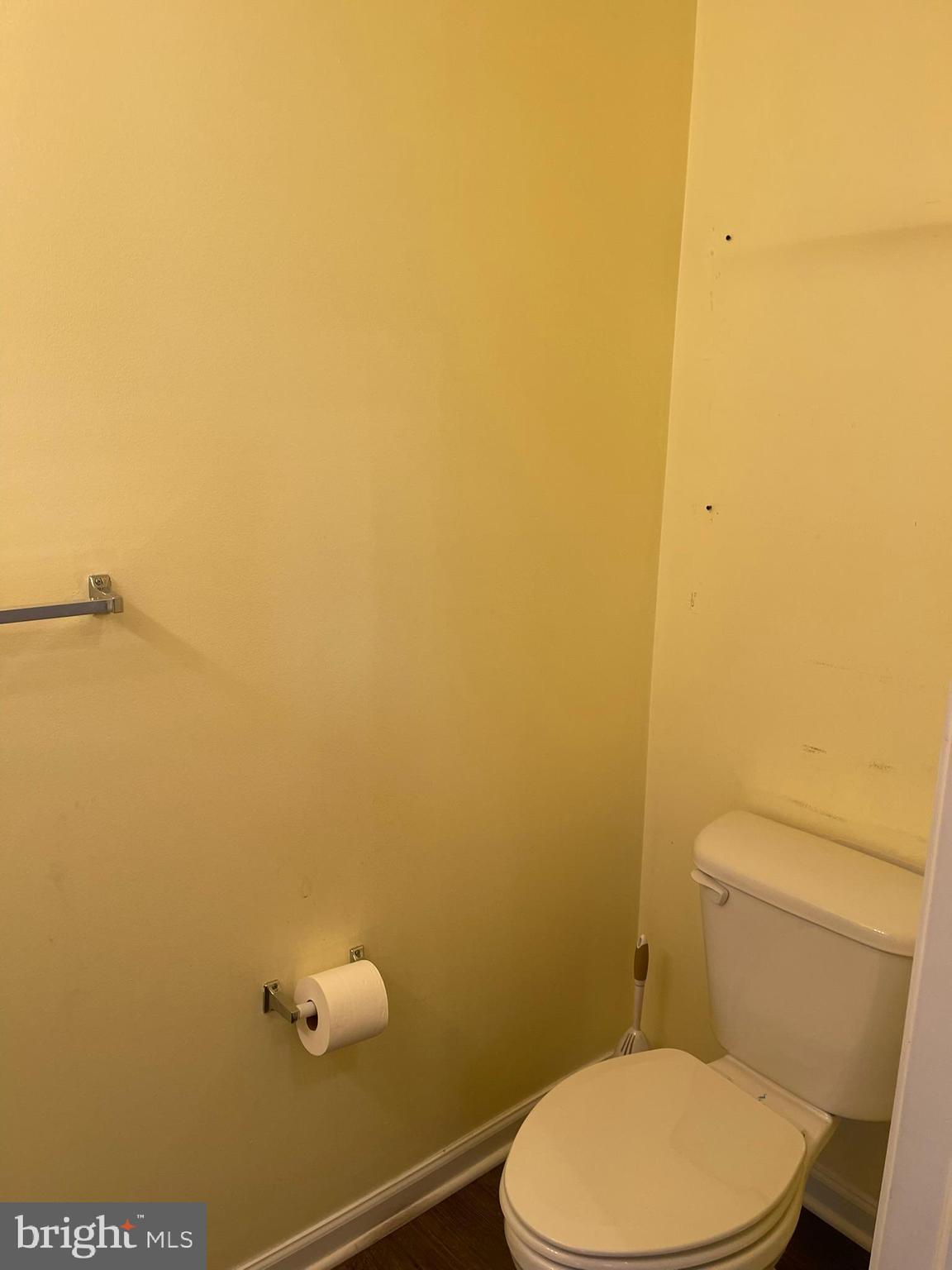 332 Liborio Drive Middletown, DE 19709 - Photo 10 of 46 a white toilet sitting next to a wooden wall