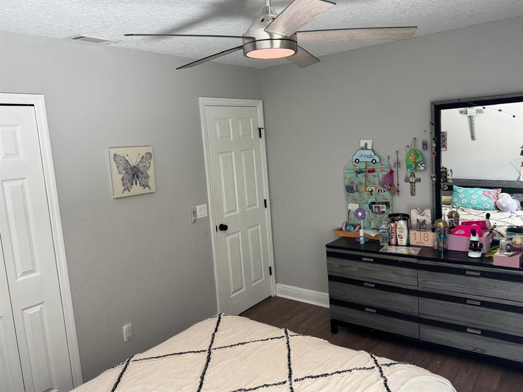 5221 Spike Horn Drive New Port Richey, FL 34653 - Photo 24 of 34 a room with painting on the wall and a window