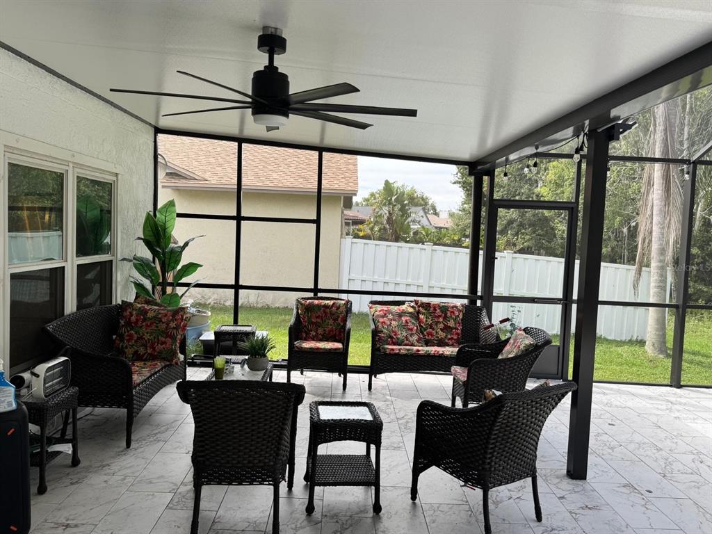 5221 Spike Horn Drive New Port Richey, FL 34653 - Photo 33 of 34 a view of a dining room with furniture window and outside view
