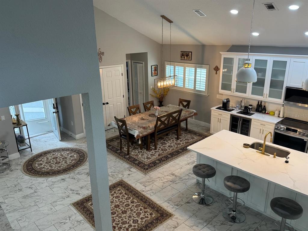 5221 Spike Horn Drive New Port Richey, FL 34653 - Photo 10 of 34 a living room with furniture and wooden floor
