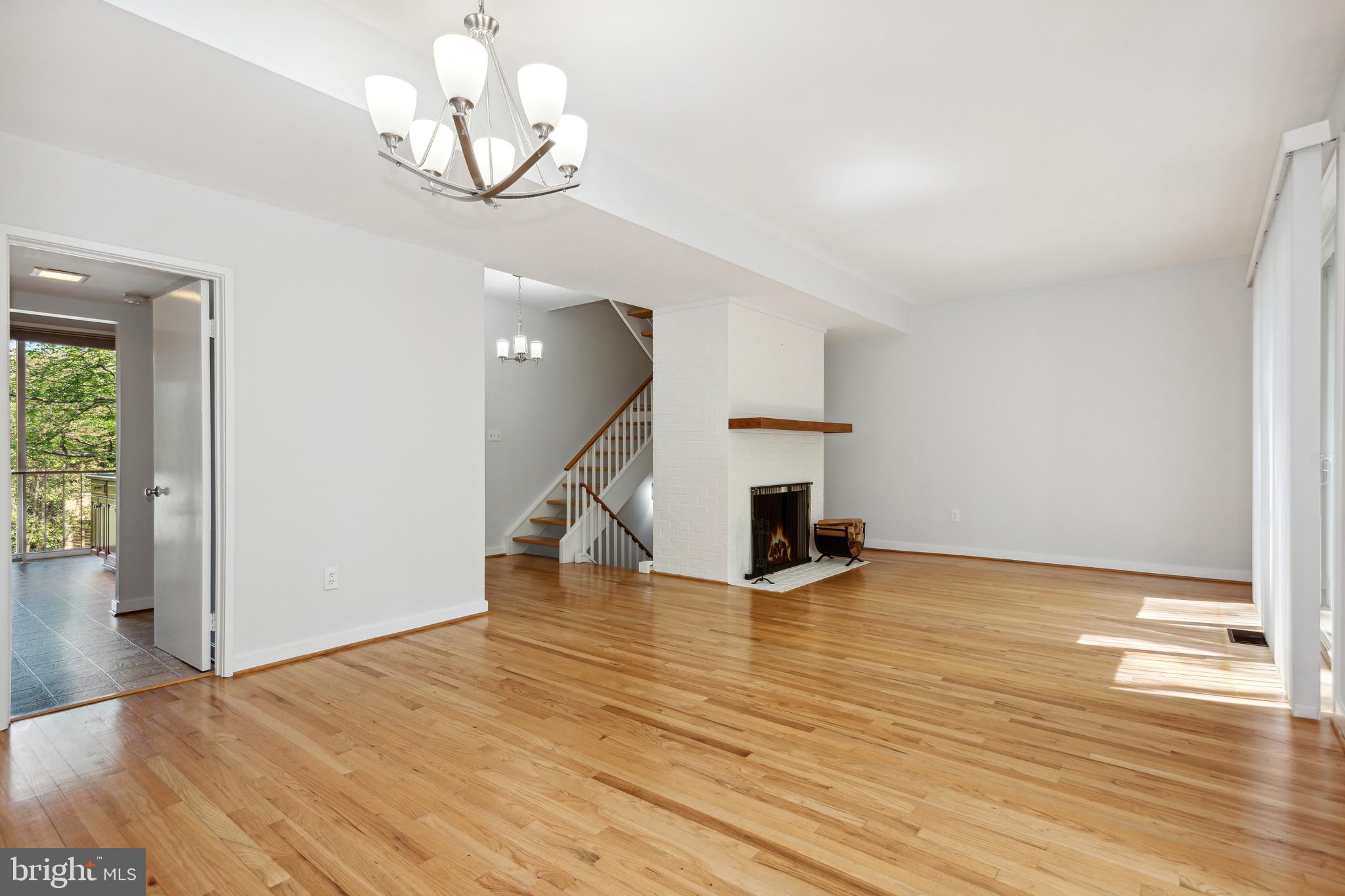11439 Waterview Cluster Reston, VA 20190 - Photo 17 of 61 a view of empty room with wooden floor