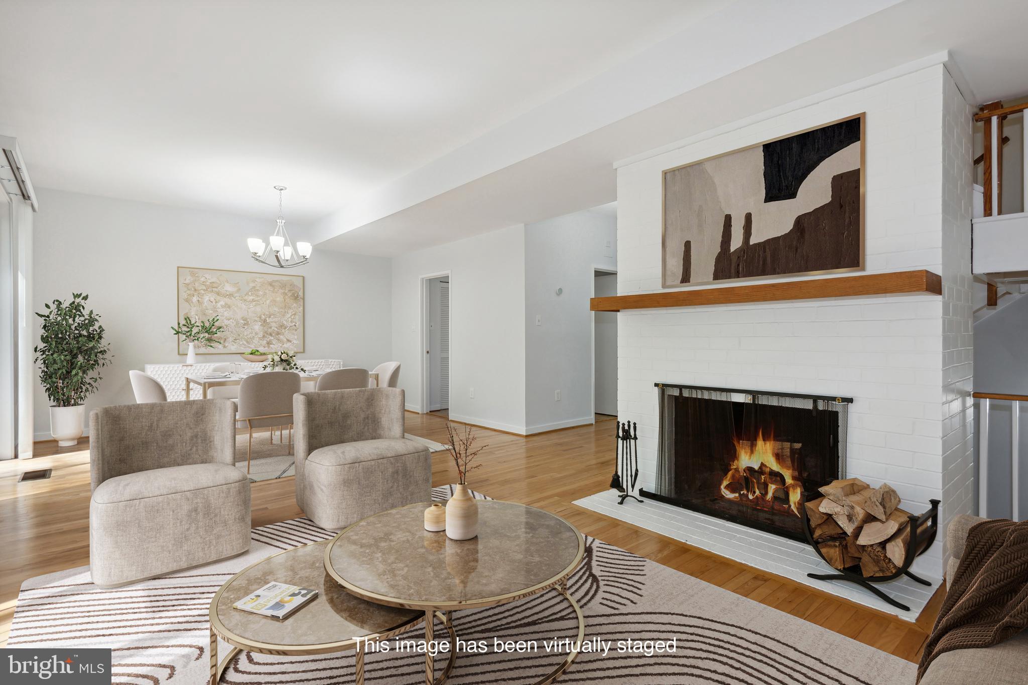 11439 Waterview Cluster Reston, VA 20190 - Photo 2 of 61 a living room with furniture and a fireplace