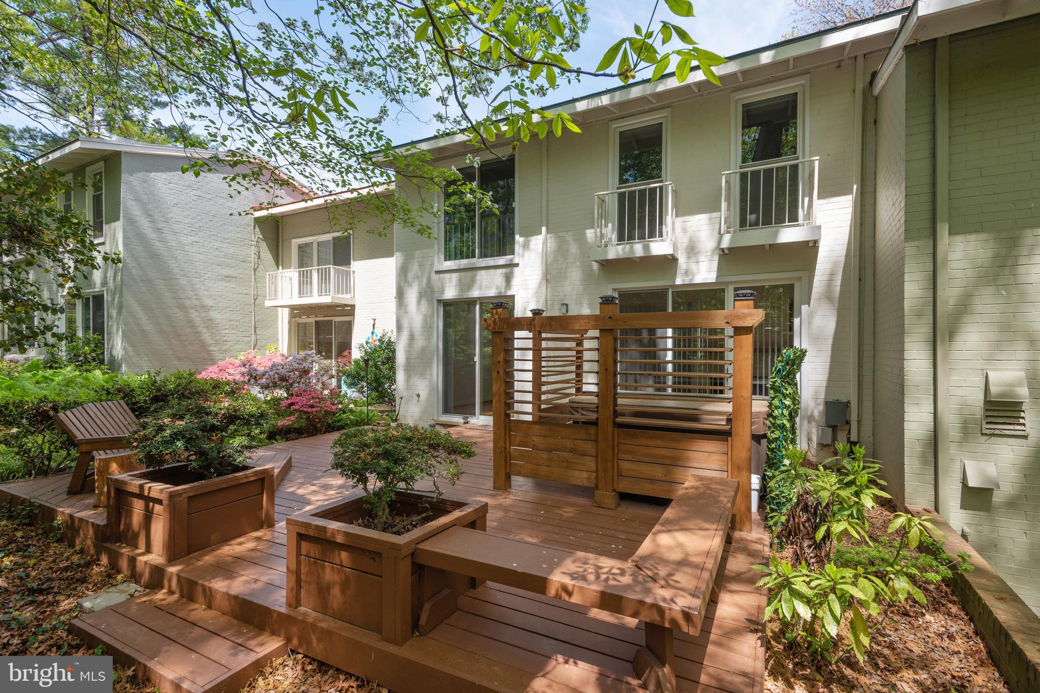 11439 Waterview Cluster Reston, VA 20190 - Photo 9 of 61 a front view of a house with outdoor seating