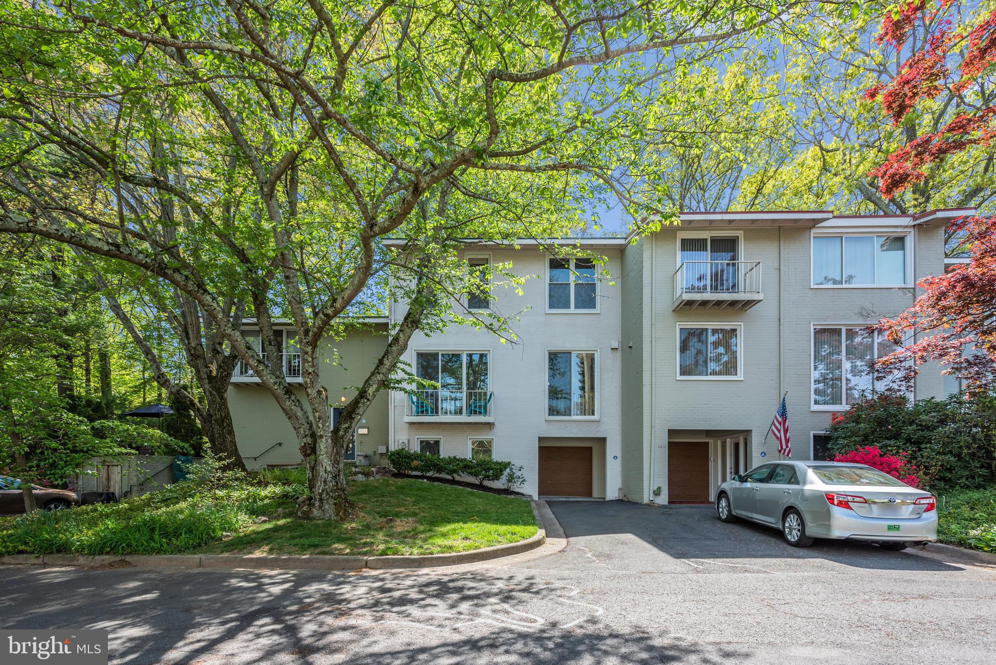 11439 Waterview Cluster Reston, VA 20190 - Photo 10 of 61 a car parked in front of white house