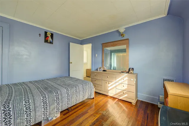 a bed room with two beds and a night stand