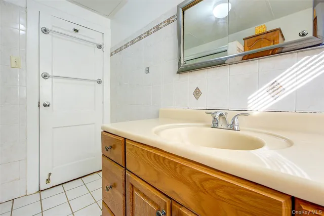 a room with furniture a washer and dryer