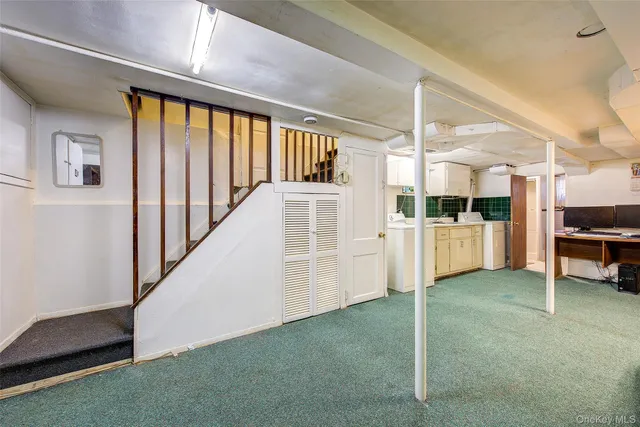 a spacious bedroom with a bed and a book shelf