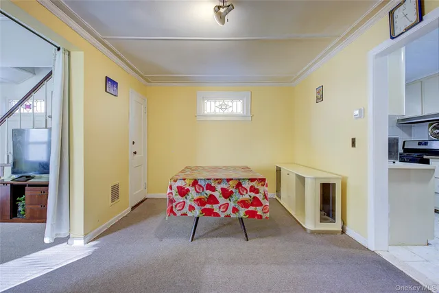 a living room with furniture and a table