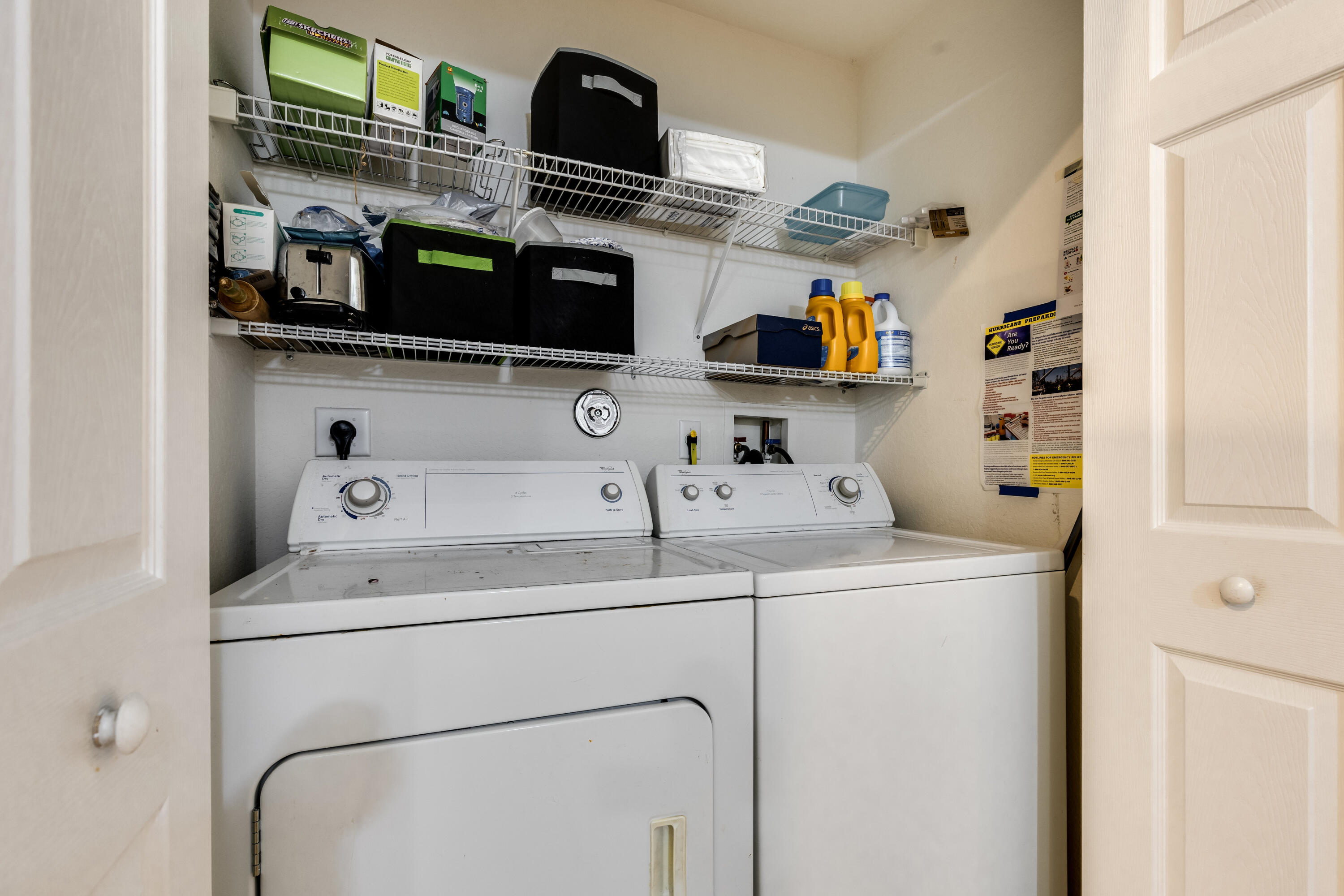 156 Village Boulevard, Unit E Tequesta, FL 33469 - Photo 32 of 36 a utility room with dryer and washer