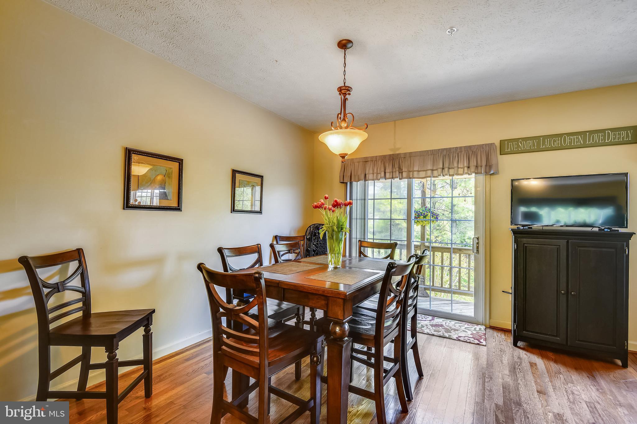 Dining Area With Doors To Porch