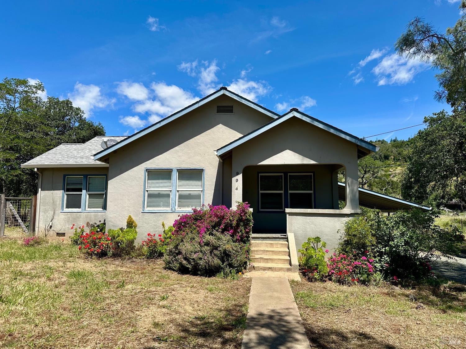 994 Sanitarium Road Deer Park, CA 94576 - Photo 1 of 21 a front view of a house with a yard