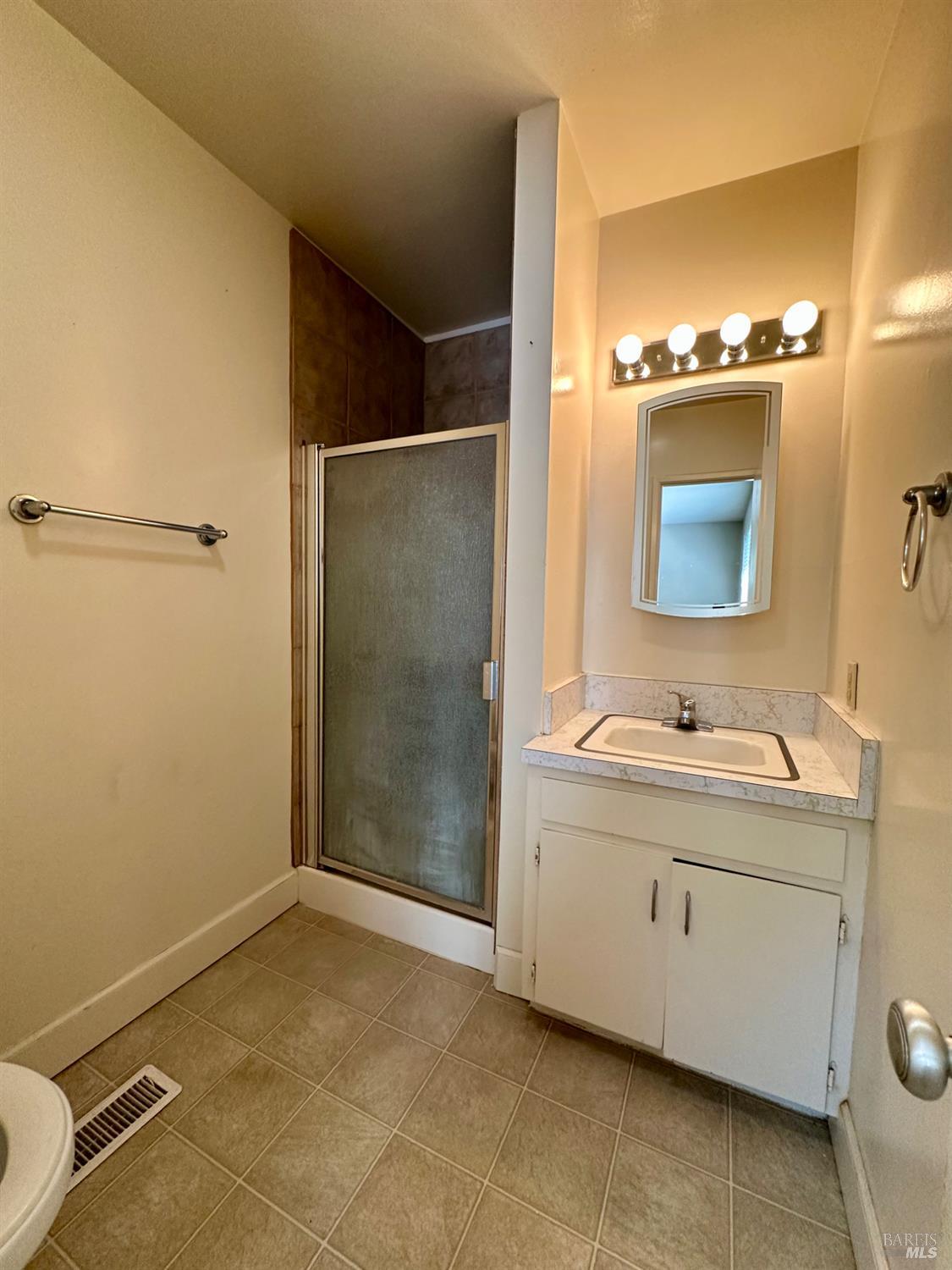 994 Sanitarium Road Deer Park, CA 94576 - Photo 16 of 21 a bathroom with a sink and a mirror