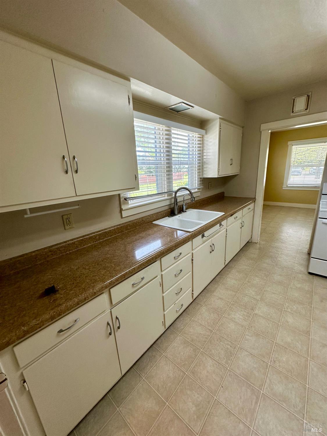 994 Sanitarium Road Deer Park, CA 94576 - Photo 9 of 21 a spacious bathroom with a sink and a window