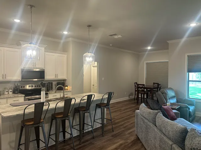 a view of a a dining room with furniture