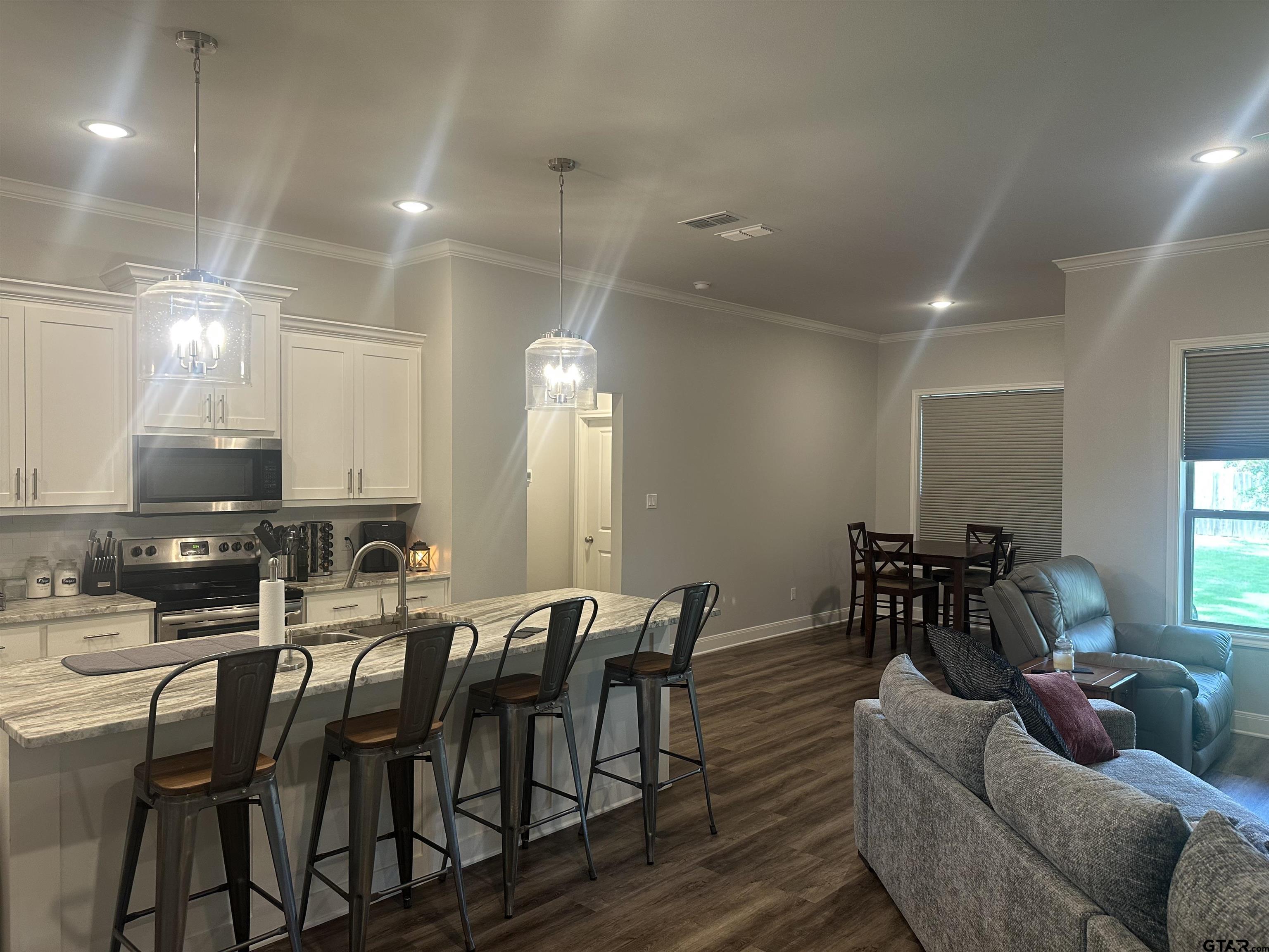 411 Deer Point Cove Chandler, TX 75758 - Photo 4 of 21 a view of a a dining room with furniture