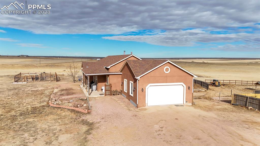 31790 Sanborn Road Yoder, CO 80864 - Photo 2 of 50 a view of houses with sky view