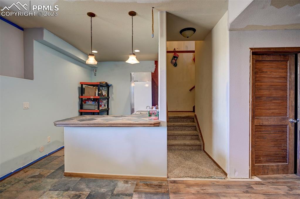 31790 Sanborn Road Yoder, CO 80864 - Photo 29 of 50 a view interior of a house with hallway
