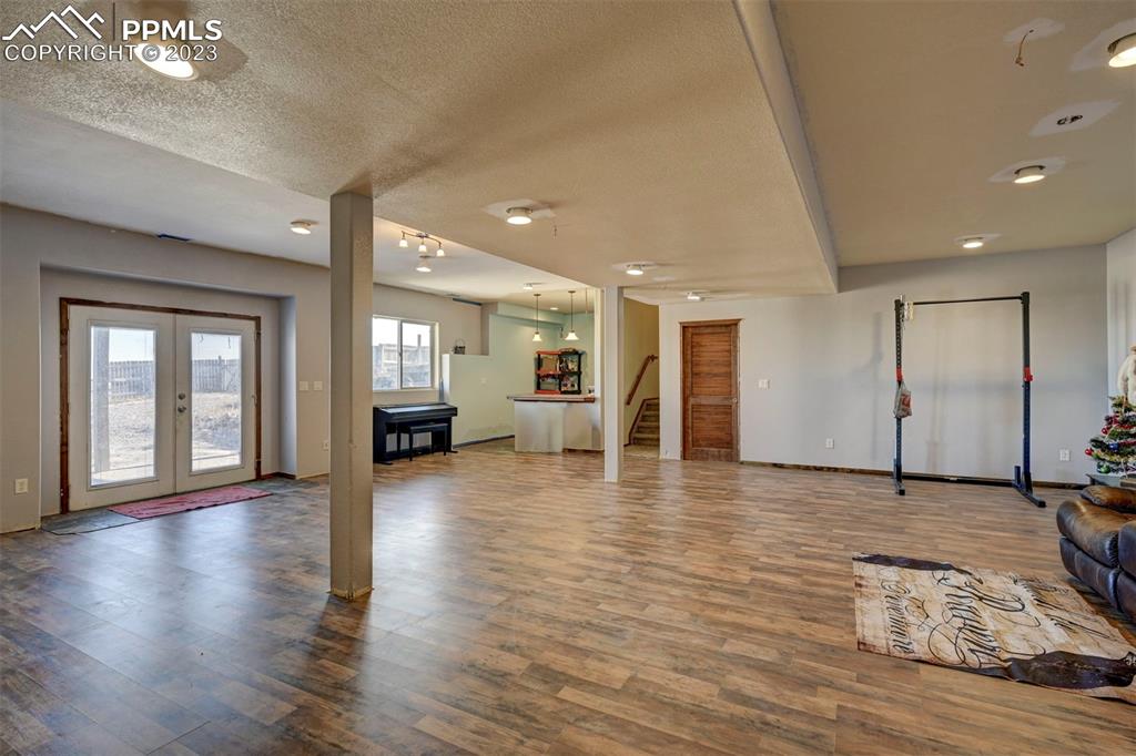 31790 Sanborn Road Yoder, CO 80864 - Photo 33 of 50 a view of an empty room and wooden floor