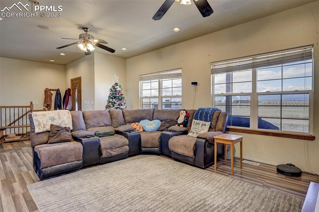 31790 Sanborn Road Yoder, CO 80864 - Photo 6 of 50 a living room with furniture and a large window