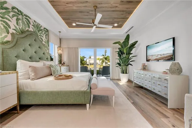 a bathroom with a bathtub sink and mirror