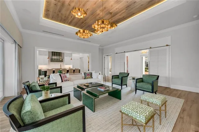 a balcony with furniture and a garden