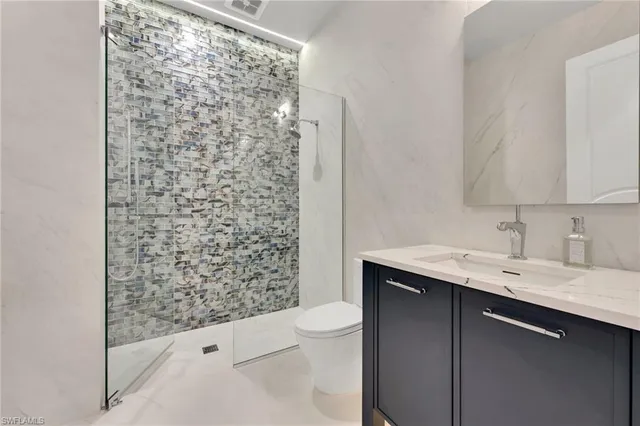 a view of a house with swimming pool outdoor seating