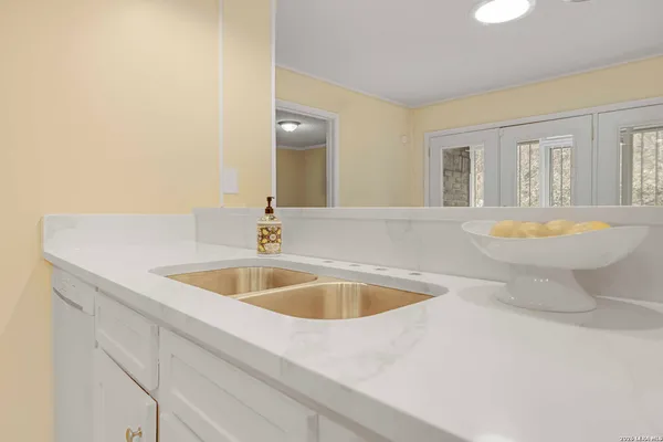 a bathroom with a sink and a bathtub