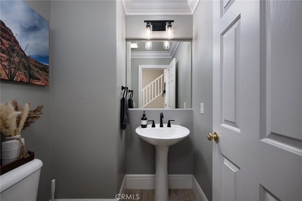 32 Berlamo Rancho Santa Margarita, CA 92688 - Photo 12 of 59 a bathroom with a sink and a mirror