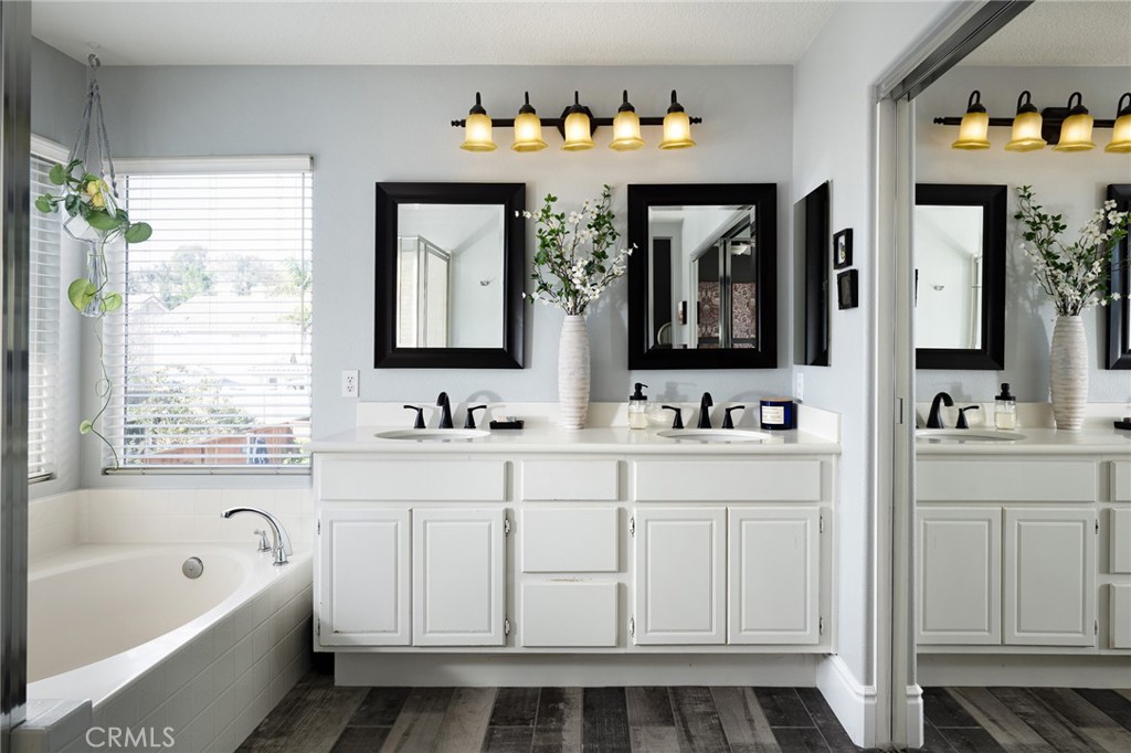 32 Berlamo Rancho Santa Margarita, CA 92688 - Photo 15 of 59 The primary bath features a dual vanity and walk in closet.