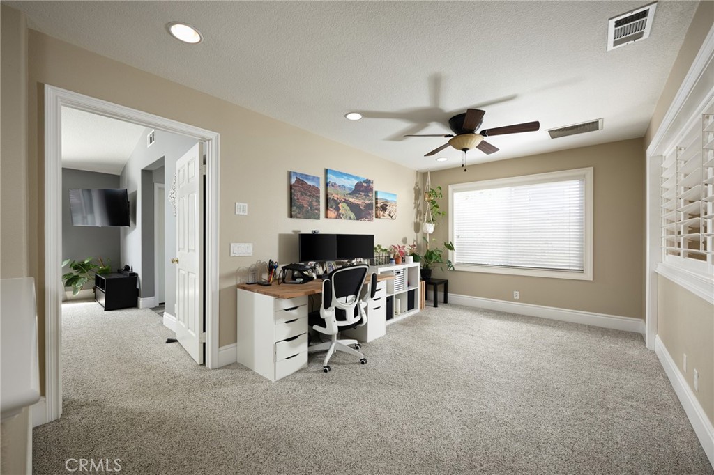 32 Berlamo Rancho Santa Margarita, CA 92688 - Photo 17 of 59 a living room with furniture and a window