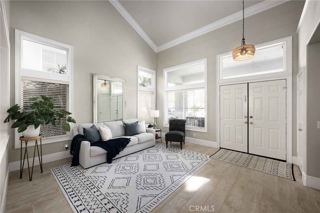 32 Berlamo Rancho Santa Margarita, CA 92688 - Photo 2 of 59 a living room with furniture rug and window