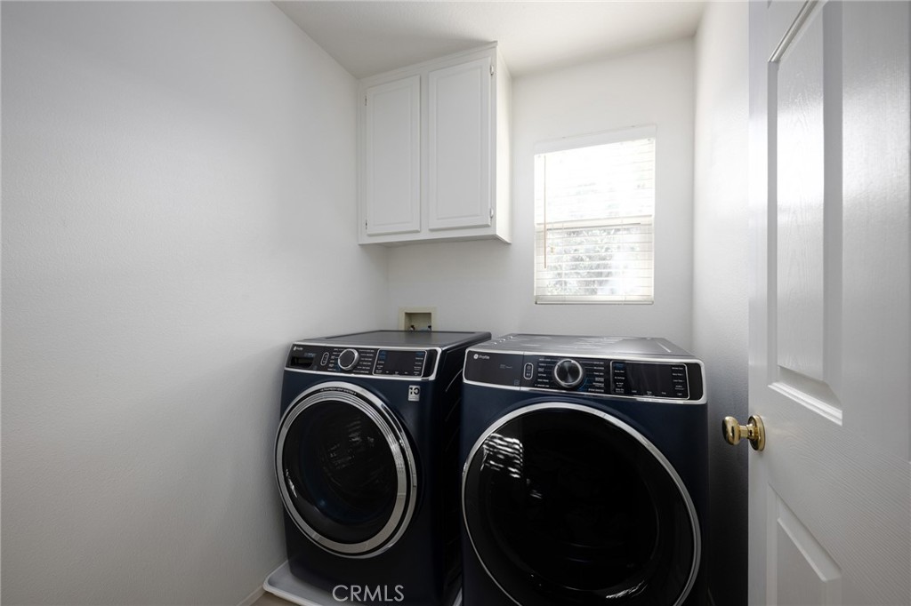 32 Berlamo Rancho Santa Margarita, CA 92688 - Photo 23 of 59 a utility room with dryer and washer