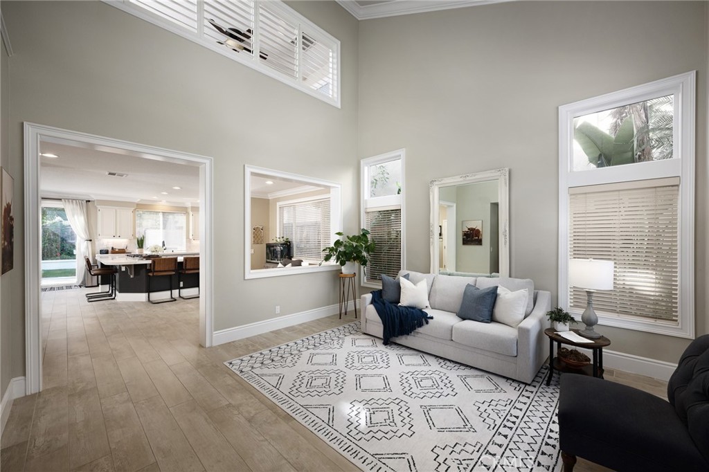 32 Berlamo Rancho Santa Margarita, CA 92688 - Photo 3 of 59 a living room with furniture and a couch