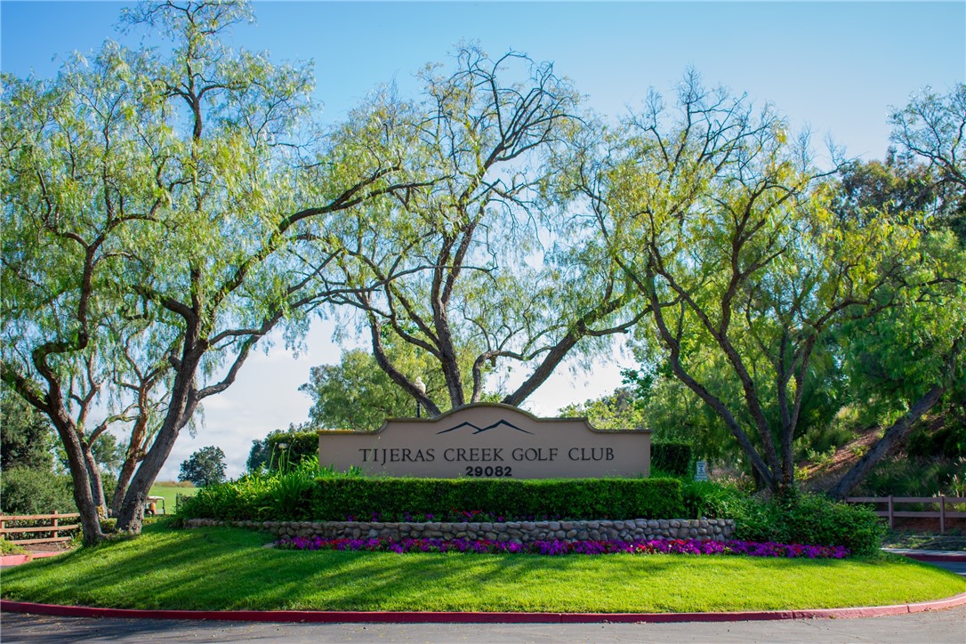 32 Berlamo Rancho Santa Margarita, CA 92688 - Photo 44 of 59 a front view of a house with a yard and garage