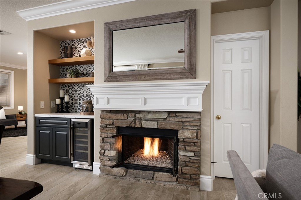 32 Berlamo Rancho Santa Margarita, CA 92688 - Photo 9 of 59 a living room with furniture and a fireplace