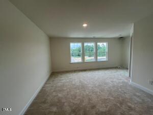 6419 Granite Quarry Drive Raleigh, NC 27610 - Photo 15 of 53 an empty room with windows