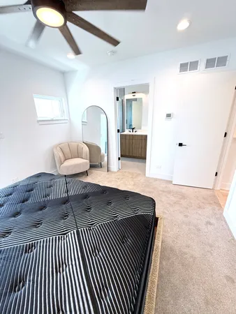 a bathroom with a double vanity sink and mirror