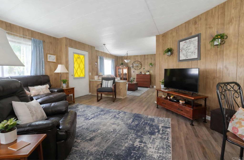 1815 Sweetwater, Unit 1 Spring Valley, CA 91977 - Photo 13 of 34 a living room with furniture and a flat screen tv