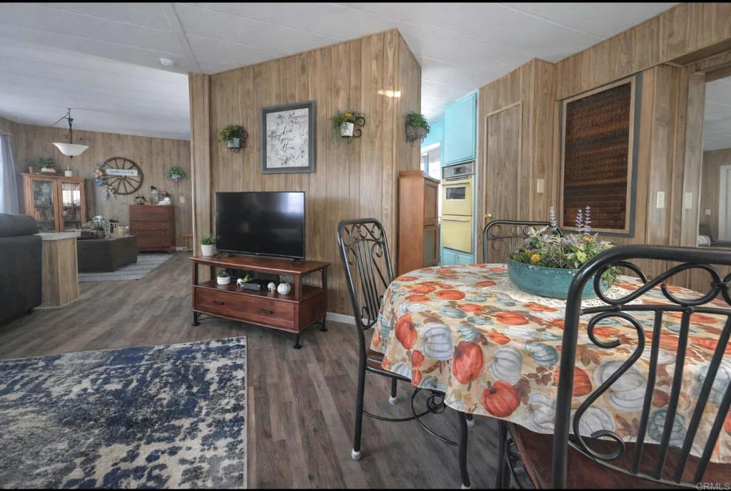 1815 Sweetwater, Unit 1 Spring Valley, CA 91977 - Photo 14 of 34 a bedroom with furniture and a flat screen tv