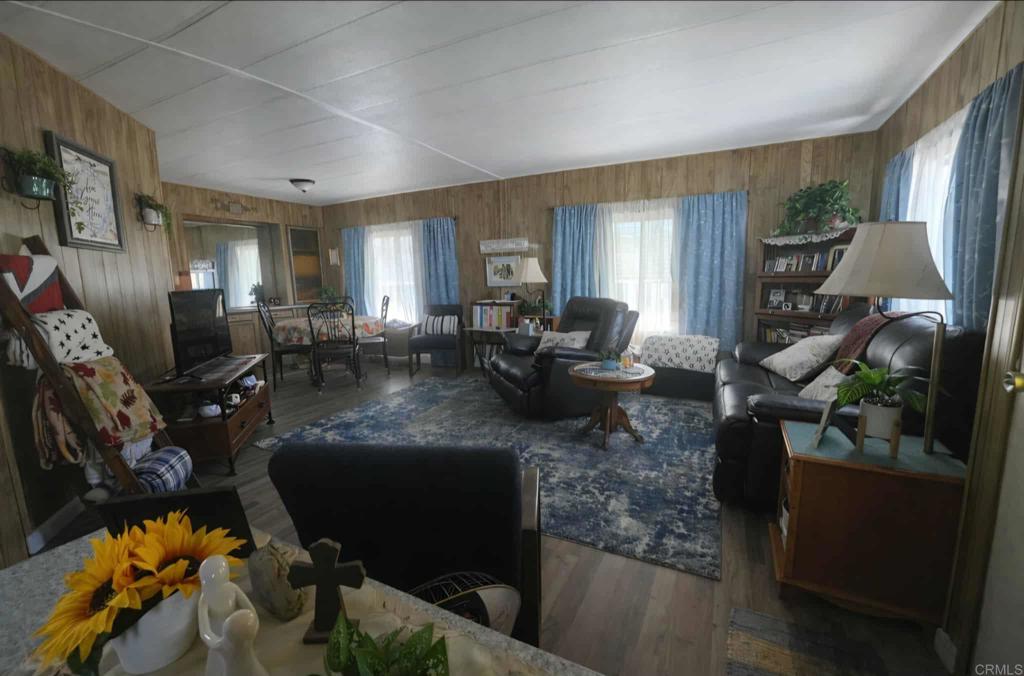 1815 Sweetwater, Unit 1 Spring Valley, CA 91977 - Photo 17 of 34 a living room with furniture and a flat screen tv