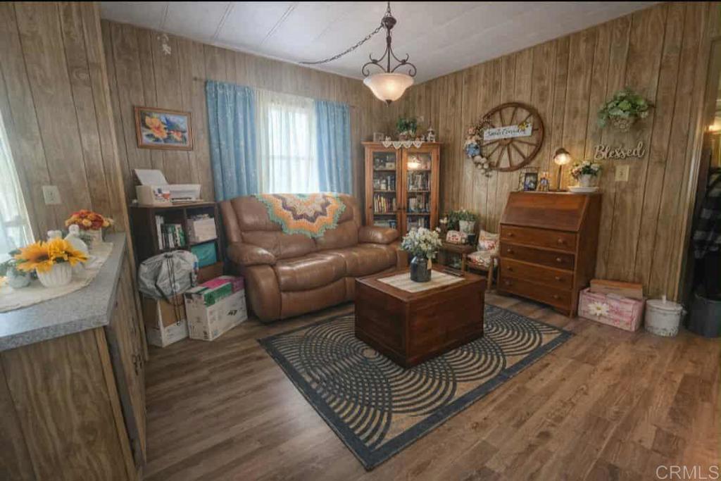 1815 Sweetwater, Unit 1 Spring Valley, CA 91977 - Photo 19 of 34 a living room with furniture and wooden floor