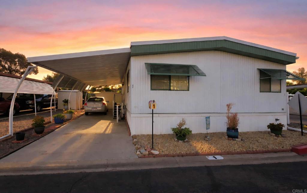 1815 Sweetwater, Unit 1 Spring Valley, CA 91977 - Photo 2 of 34 a view of a house with a patio