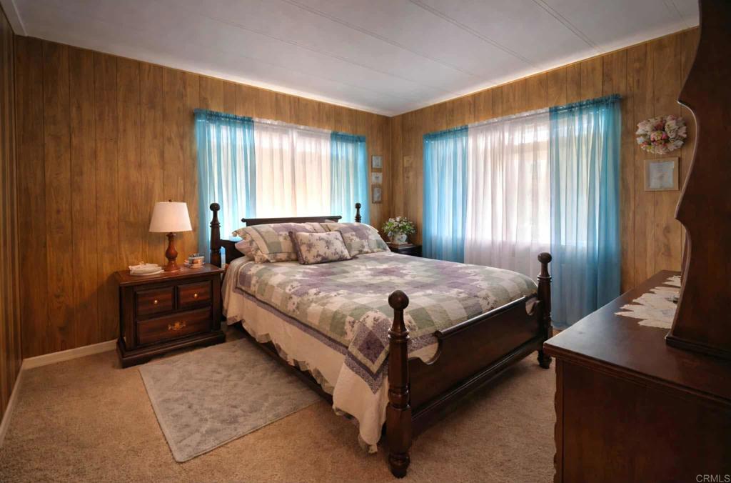 1815 Sweetwater, Unit 1 Spring Valley, CA 91977 - Photo 23 of 34 a bedroom with a bed and a window