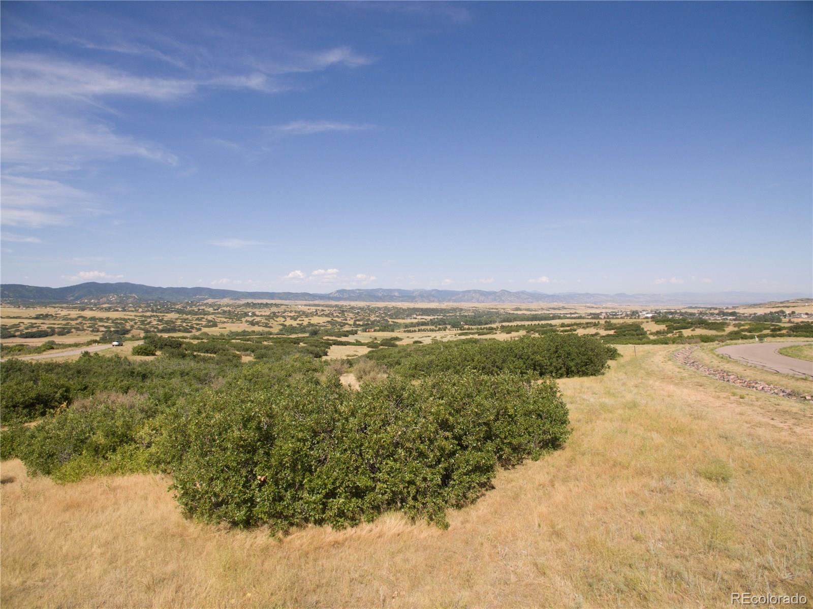 3226 Keep Drive Sedalia, CO 80135 - Photo 5 of 14 a view of an ocean and mountain