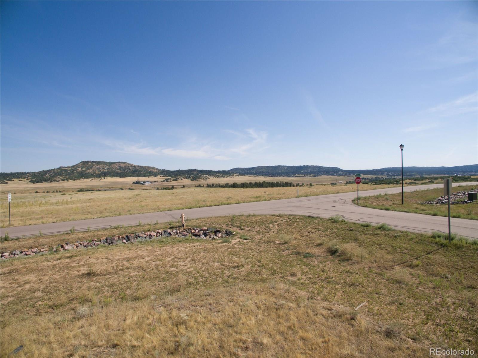 3226 Keep Drive Sedalia, CO 80135 - Photo 8 of 14 a view of an ocean and beach