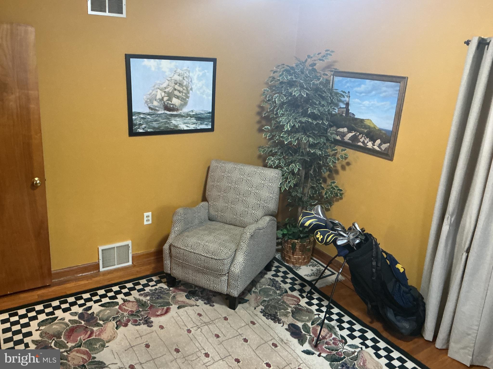 6150 Chambers Hill Road Harrisburg, PA 17111 - Photo 11 of 24 a living room with furniture and a rug