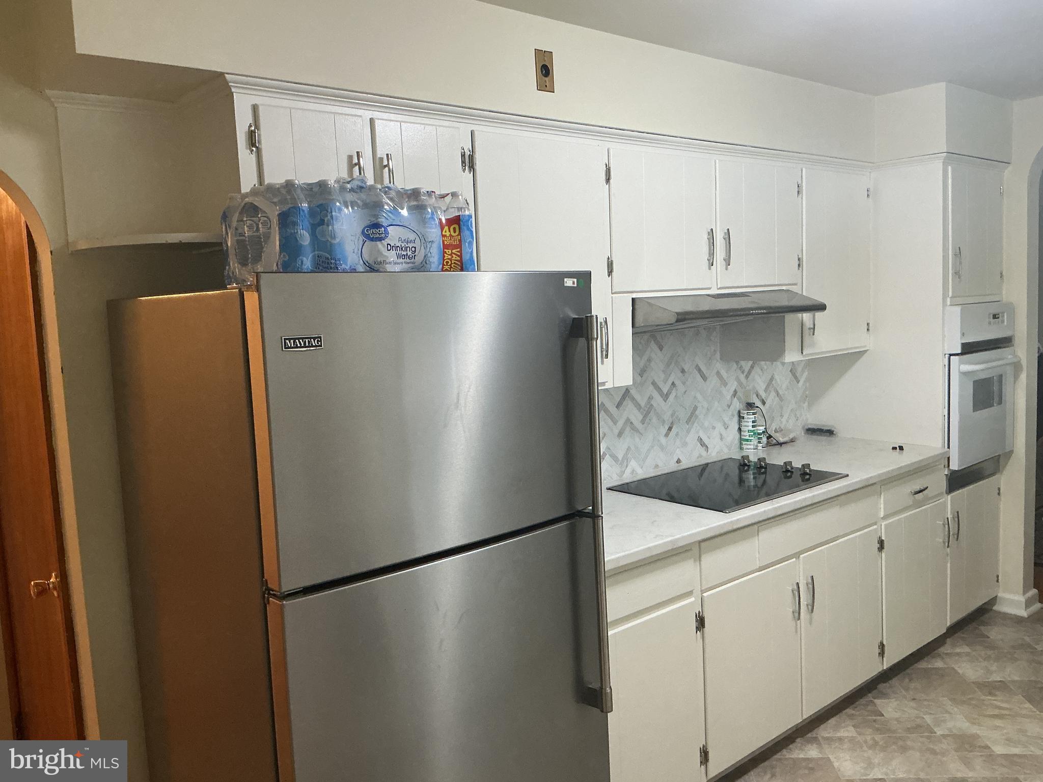 6150 Chambers Hill Road Harrisburg, PA 17111 - Photo 13 of 24 a white refrigerator freezer sitting inside of a kitchen