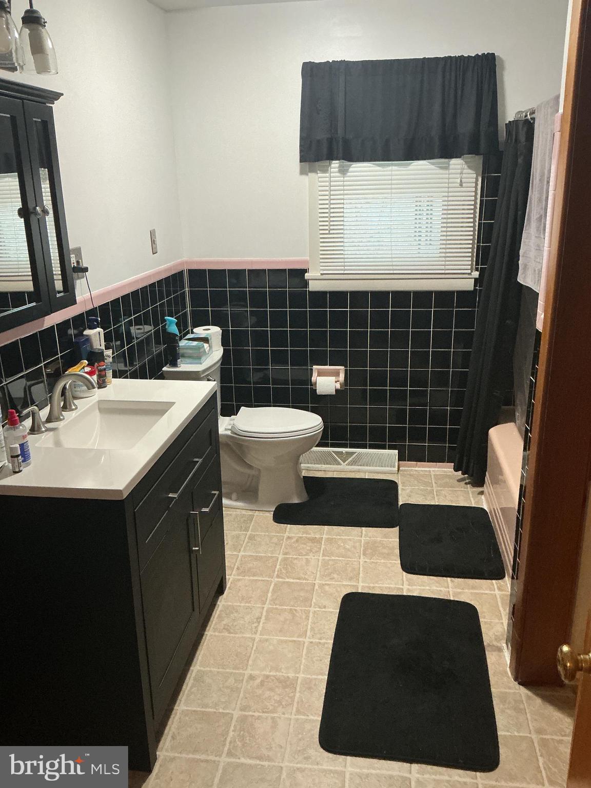 6150 Chambers Hill Road Harrisburg, PA 17111 - Photo 16 of 24 a bathroom with a sink and a mirror