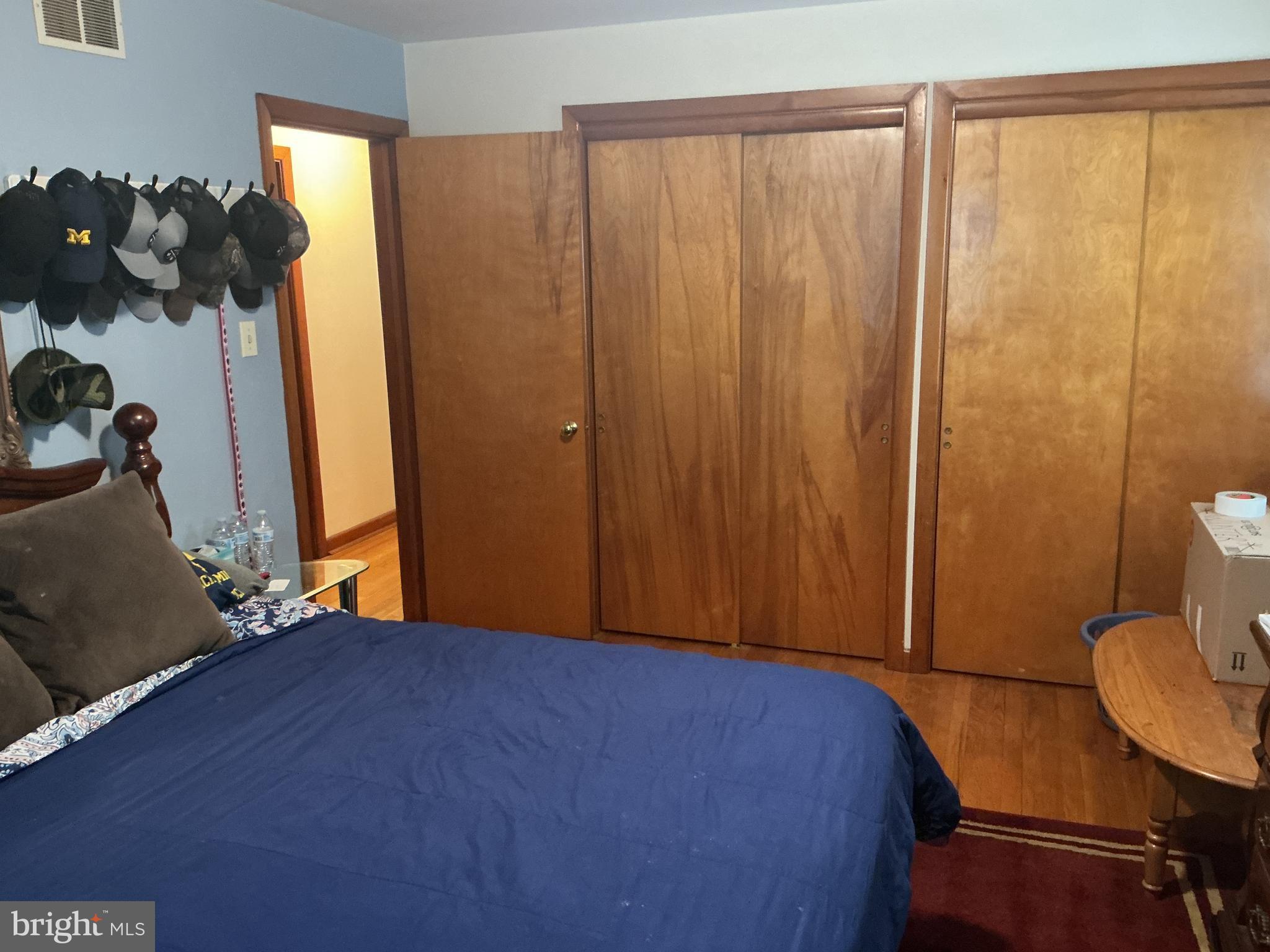 6150 Chambers Hill Road Harrisburg, PA 17111 - Photo 18 of 24 a bedroom with a bed and a dresser