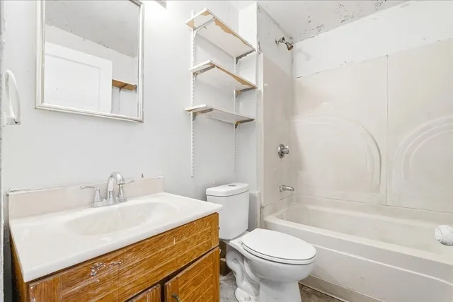 a bathroom with a sink a toilet and a bathtub